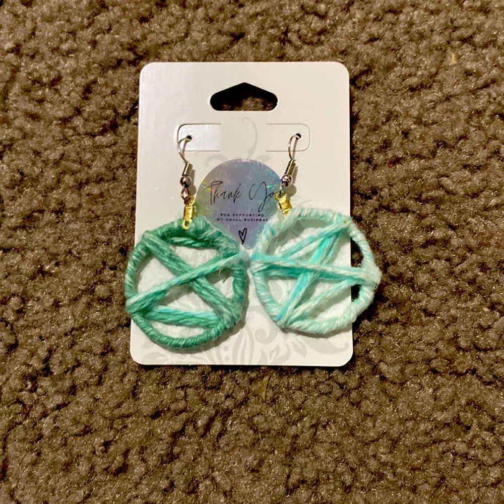 Handmade earrings wrapped with yarn